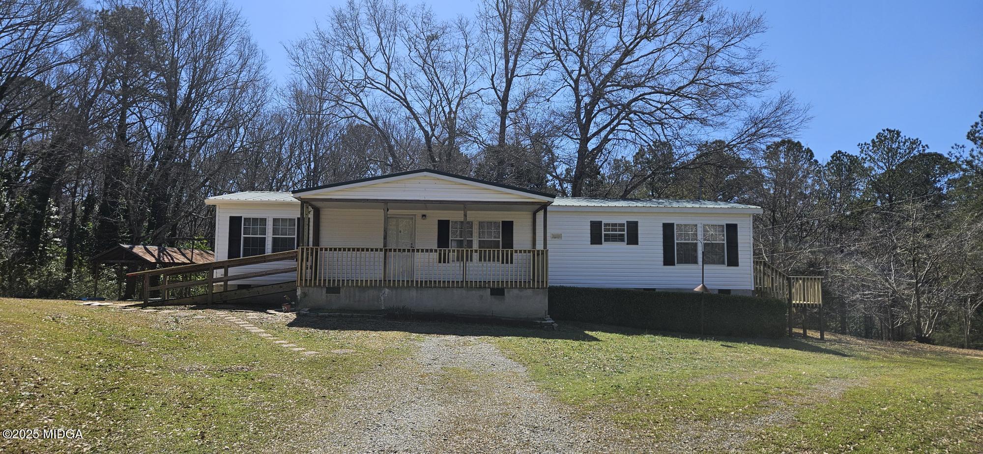 121 5 Points Road Gray, GA 31032 - Photo 1 of 20 a front view of a house with a yard