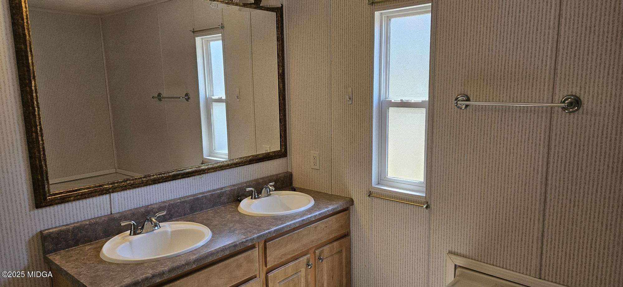 121 5 Points Road Gray, GA 31032 - Photo 14 of 20 a bathroom with 2 sink and a mirror