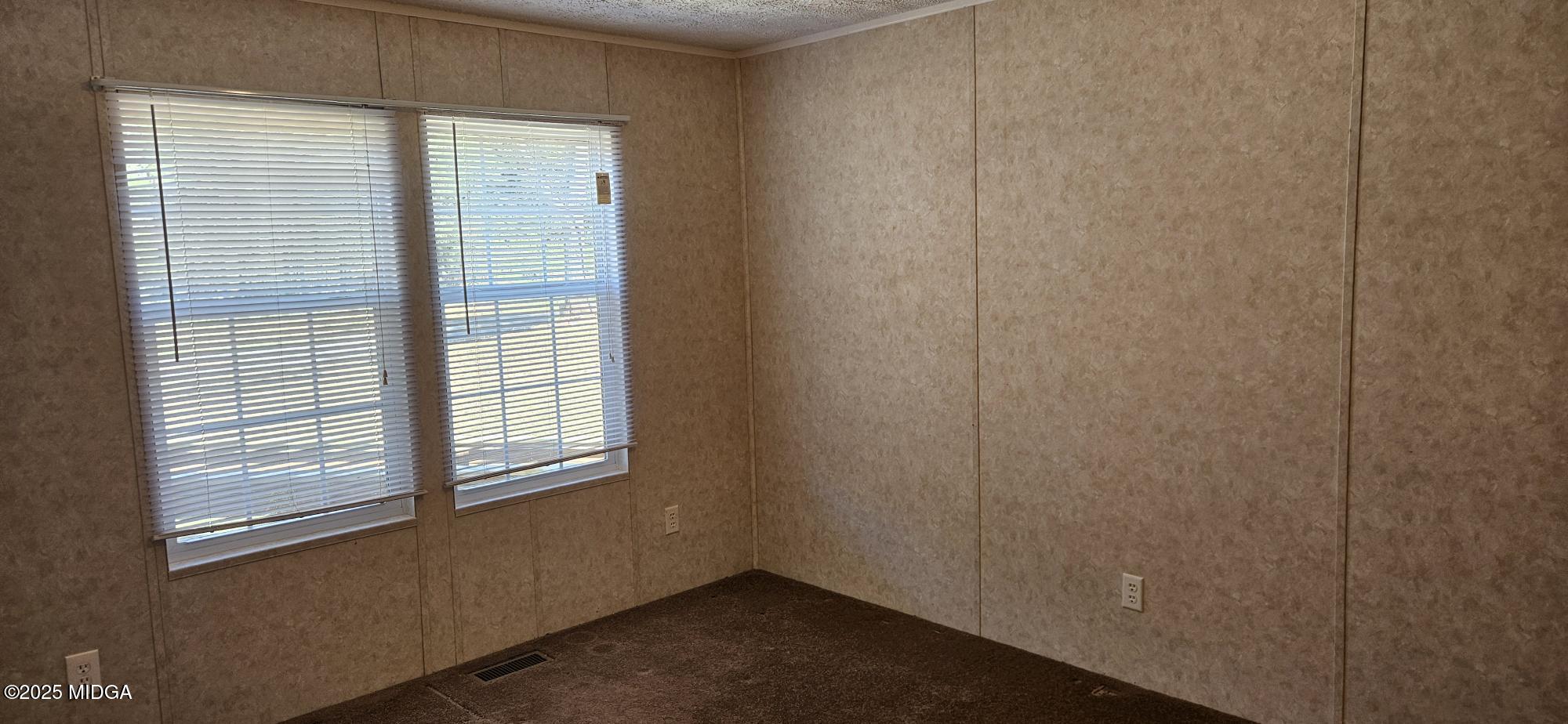 121 5 Points Road Gray, GA 31032 - Photo 19 of 20 a view of an empty room with a window