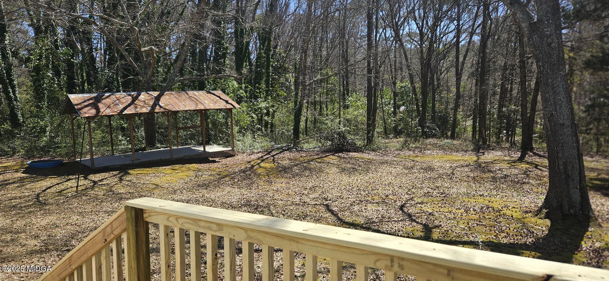 121 5 Points Road Gray, GA 31032 - Photo 20 of 20 a view of a wooden fence with a yard