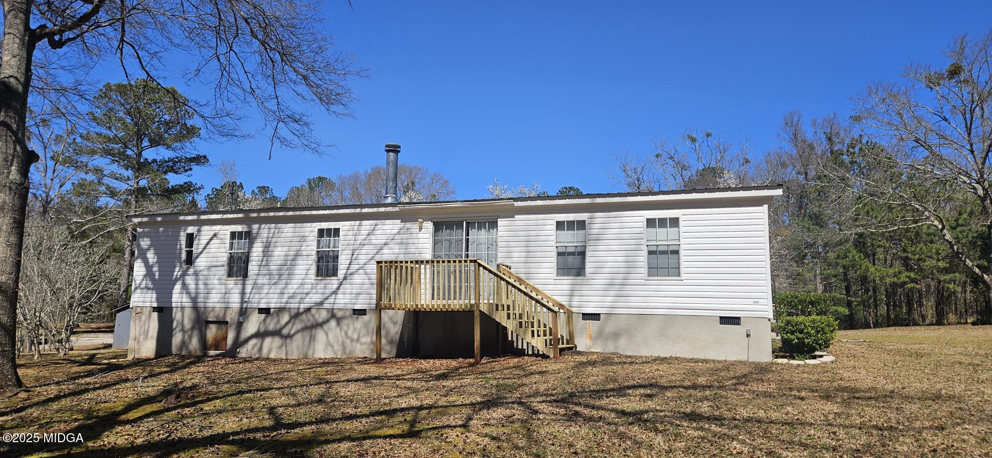121 5 Points Road Gray, GA 31032 - Photo 3 of 20 a view of a house with a yard