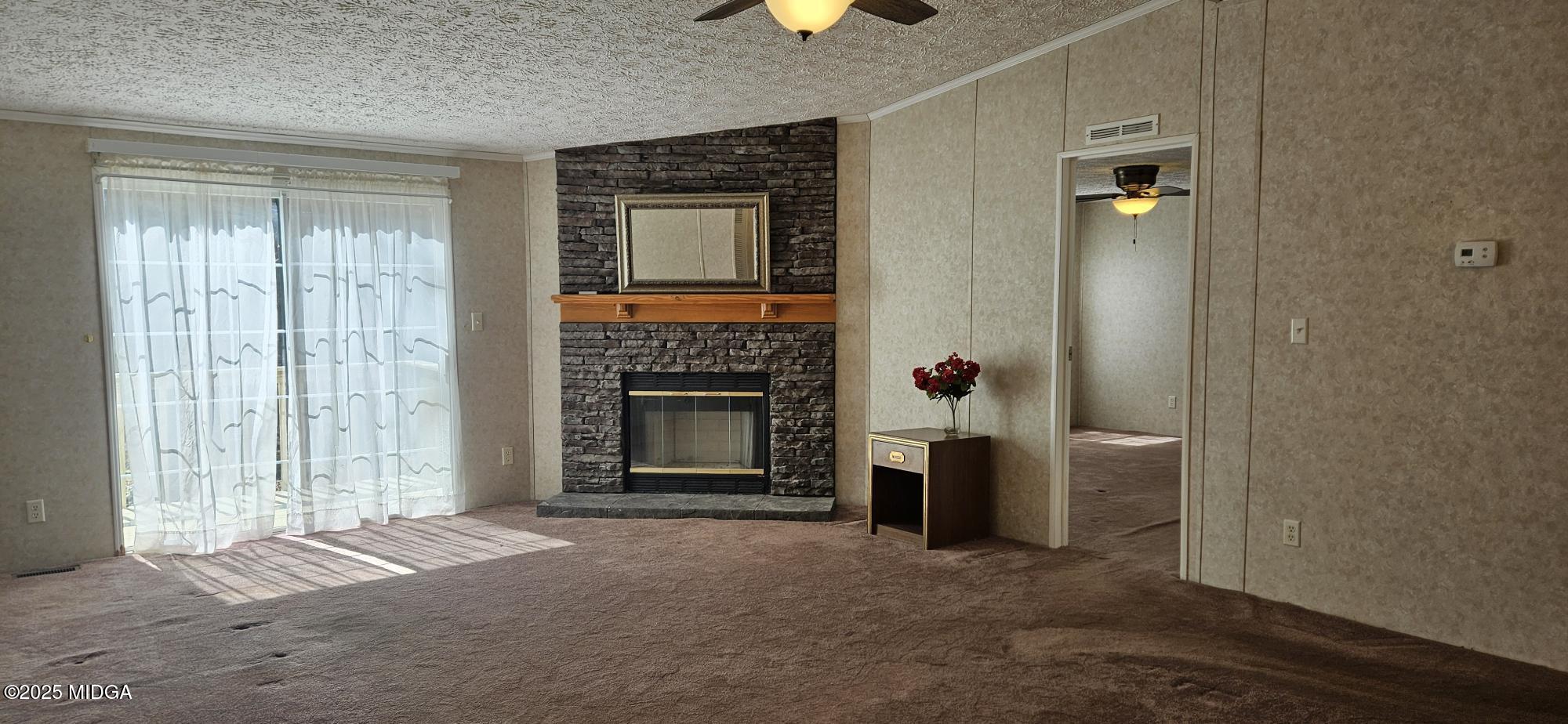121 5 Points Road Gray, GA 31032 - Photo 8 of 20 a living room with furniture and a fireplace