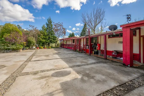 a kitchen with a refrigerator and a sink