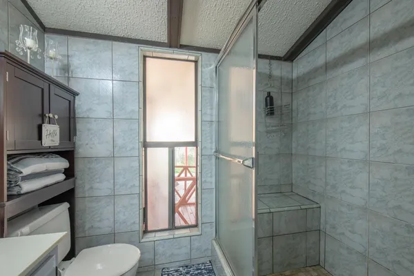a view of an outdoor space and a bathroom