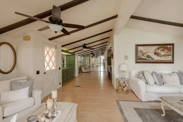 a view of a backyard with swimming pool