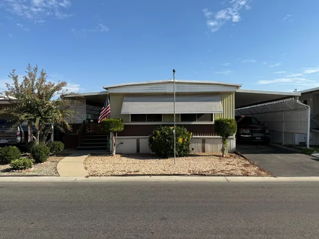 a view of a house with a patio