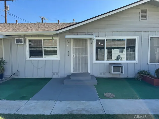 a view of a house with a garden