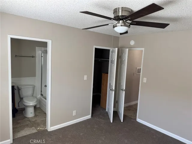 a view of a bathroom with a sink and a mirror