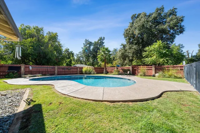 a gym room with lots of gym equipment