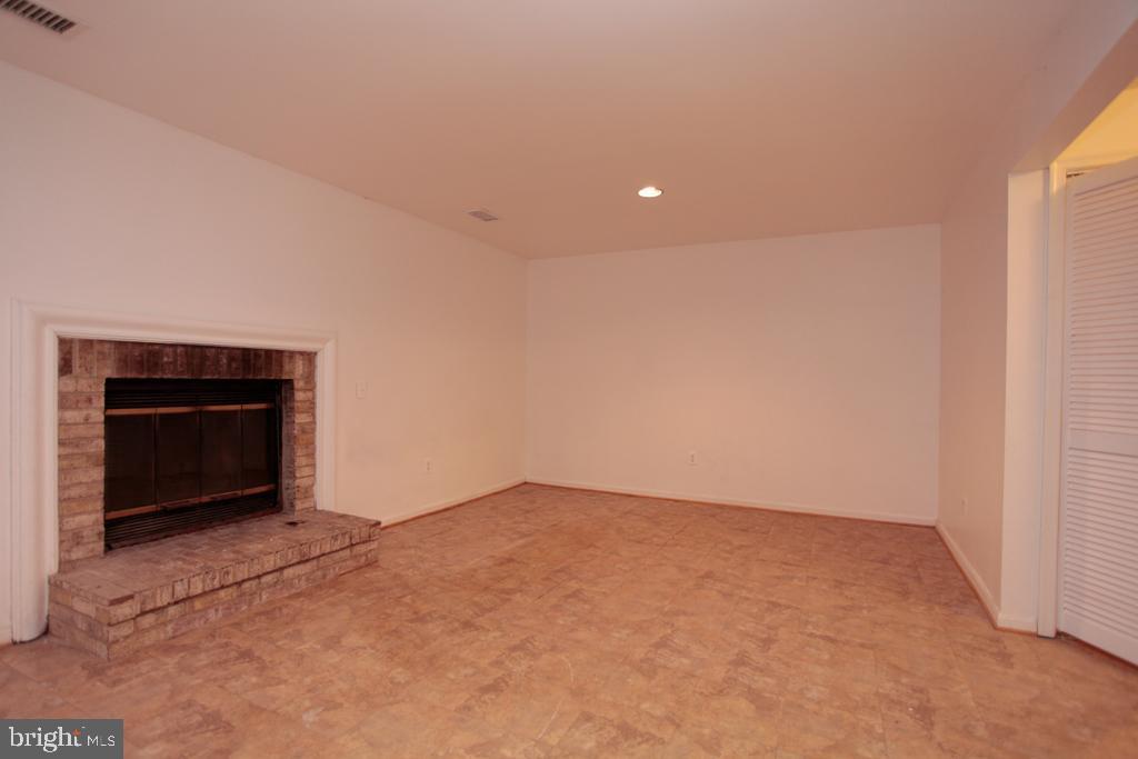 109 Finale Terrace Silver Spring, MD 20901 - Photo 82 of 100 Rec Room with Wood Burning Fire Place