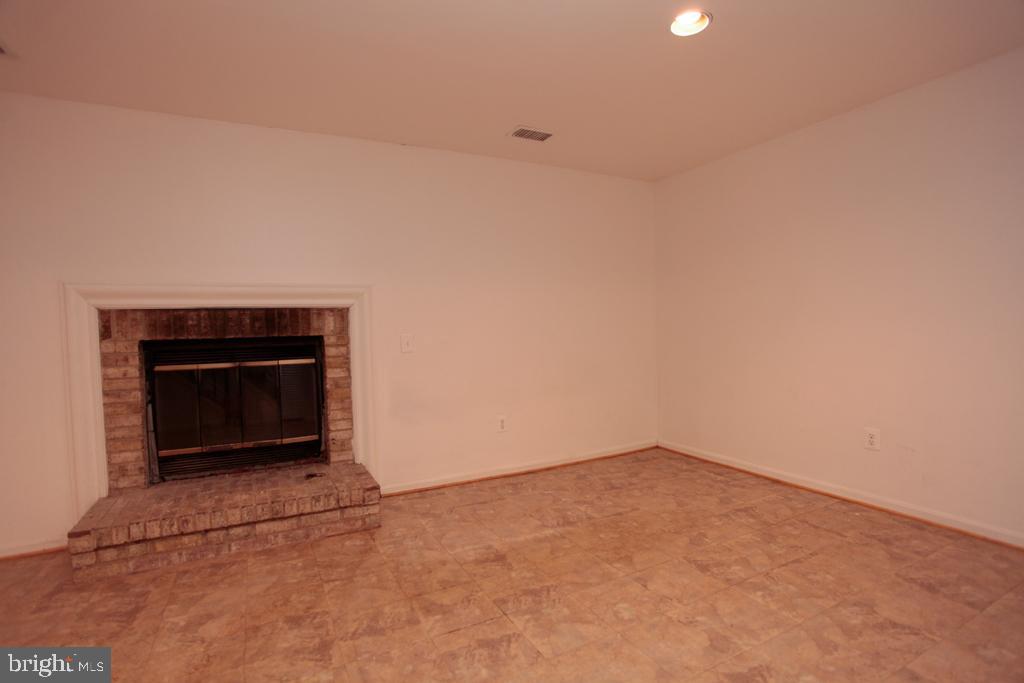 109 Finale Terrace Silver Spring, MD 20901 - Photo 83 of 100 Rec Room with Wood Burning Fire Place