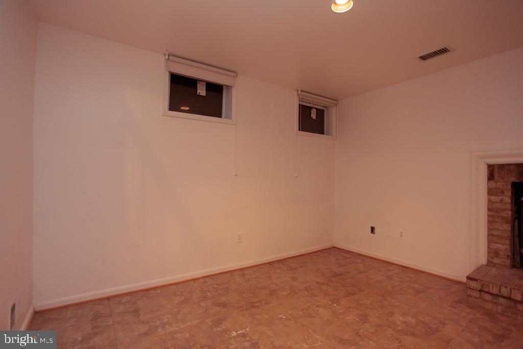 109 Finale Terrace Silver Spring, MD 20901 - Photo 85 of 100 Rec Room with Wood Burning Fire Place