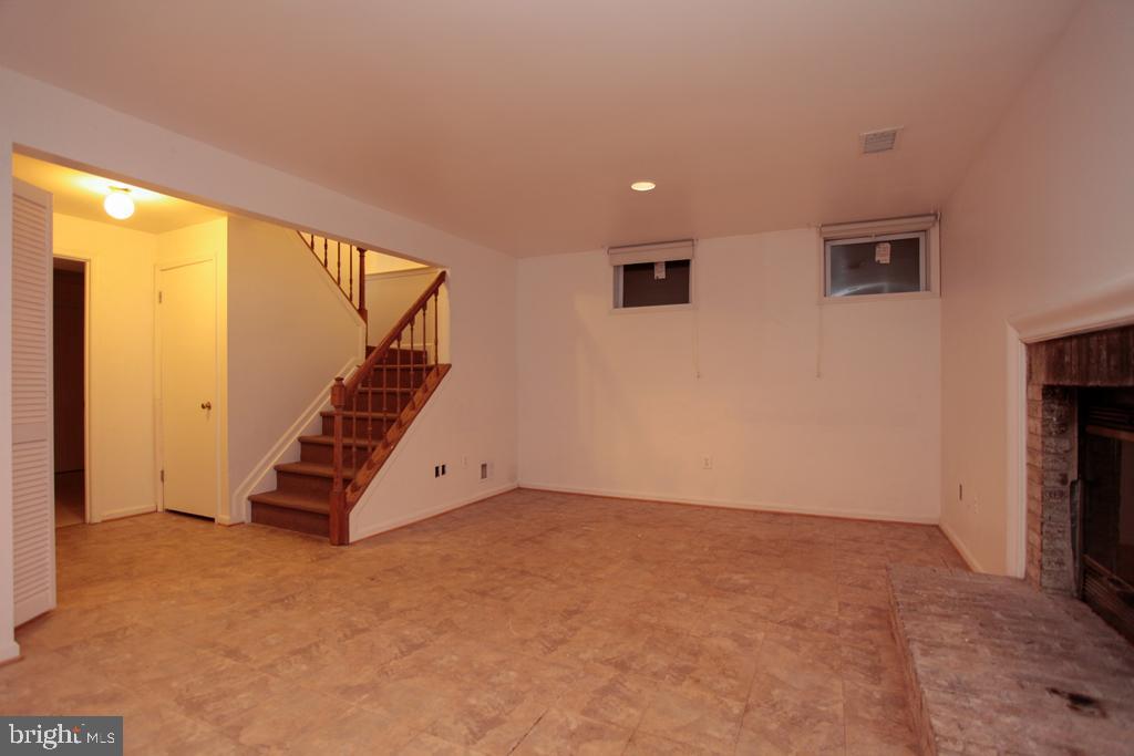109 Finale Terrace Silver Spring, MD 20901 - Photo 86 of 100 Rec Room with Wood Burning Fire Place