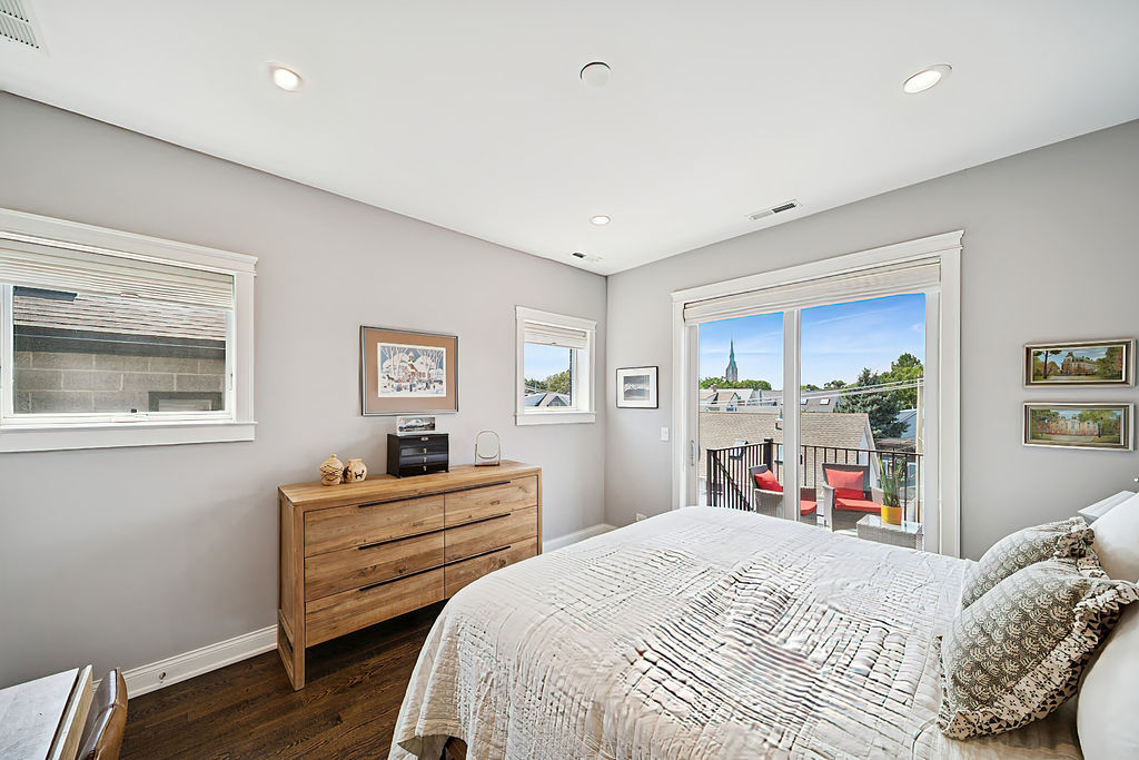 3044 North Racine Avenue, Unit 3 Chicago, IL 60657 - Photo 11 of 29 a bedroom with bed and a closet