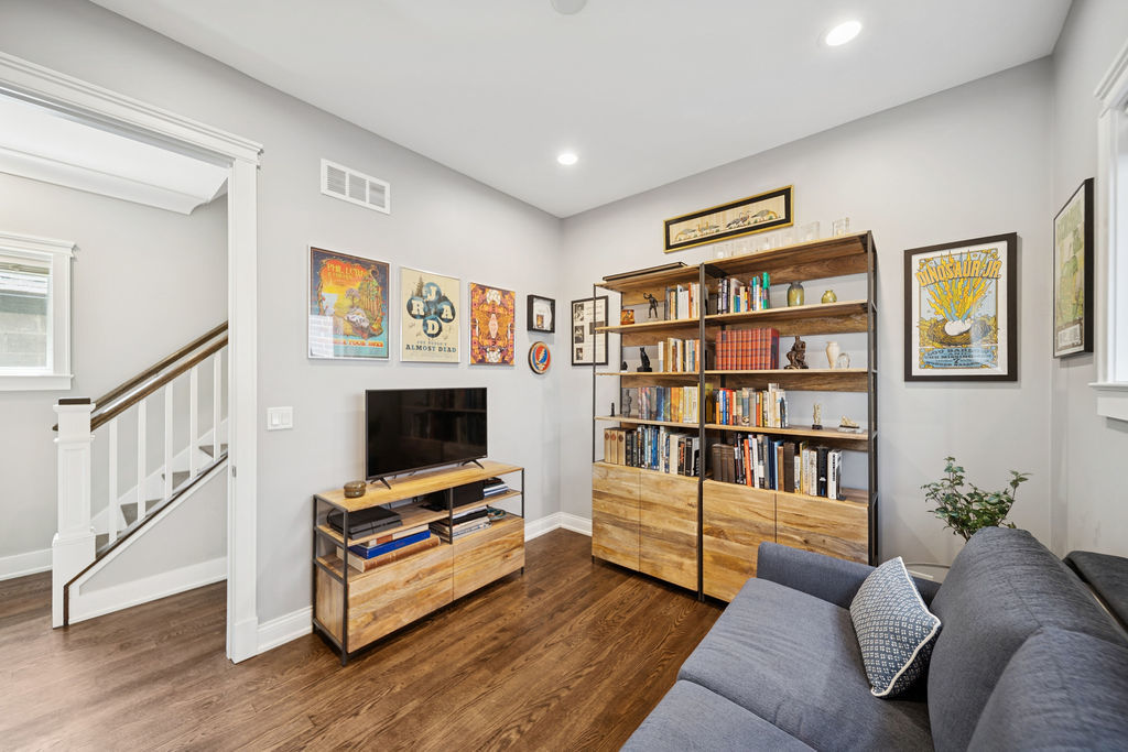 3044 North Racine Avenue, Unit 3 Chicago, IL 60657 - Photo 16 of 29 a living room with furniture and a flat screen tv