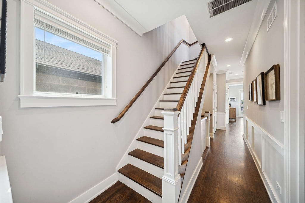 3044 North Racine Avenue, Unit 3 Chicago, IL 60657 - Photo 19 of 29 a view of staircase with wooden floor and floors