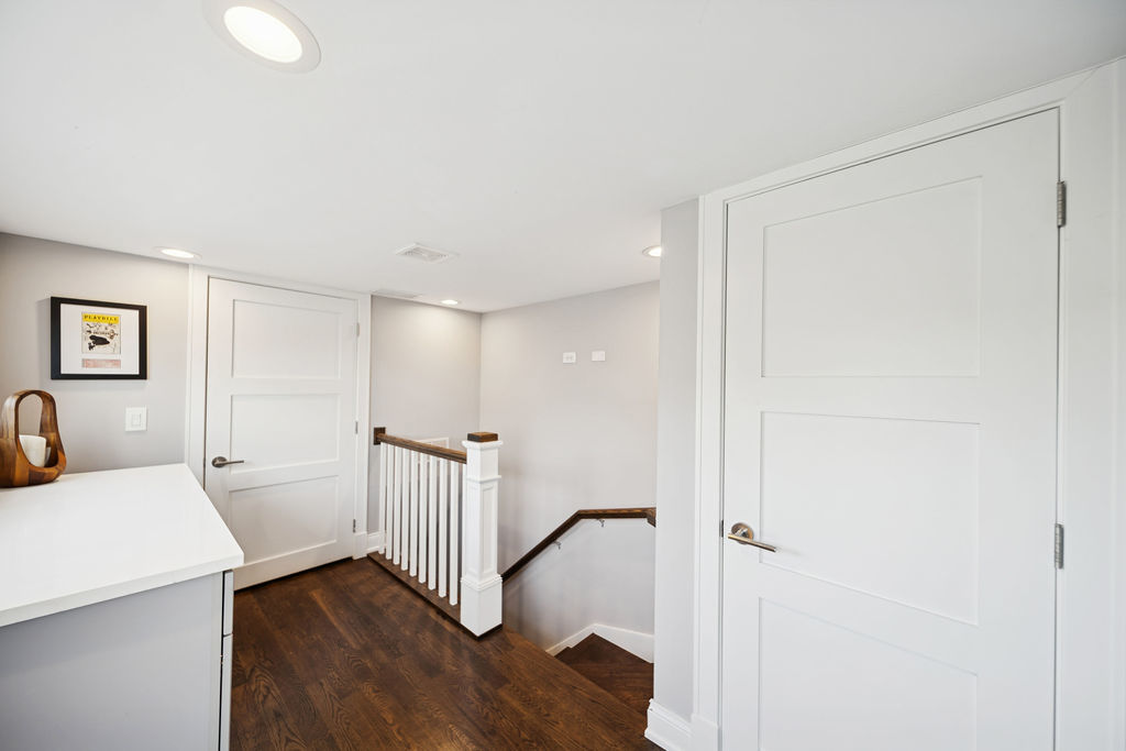 3044 North Racine Avenue, Unit 3 Chicago, IL 60657 - Photo 20 of 29 a view of a room with wooden floor and windows