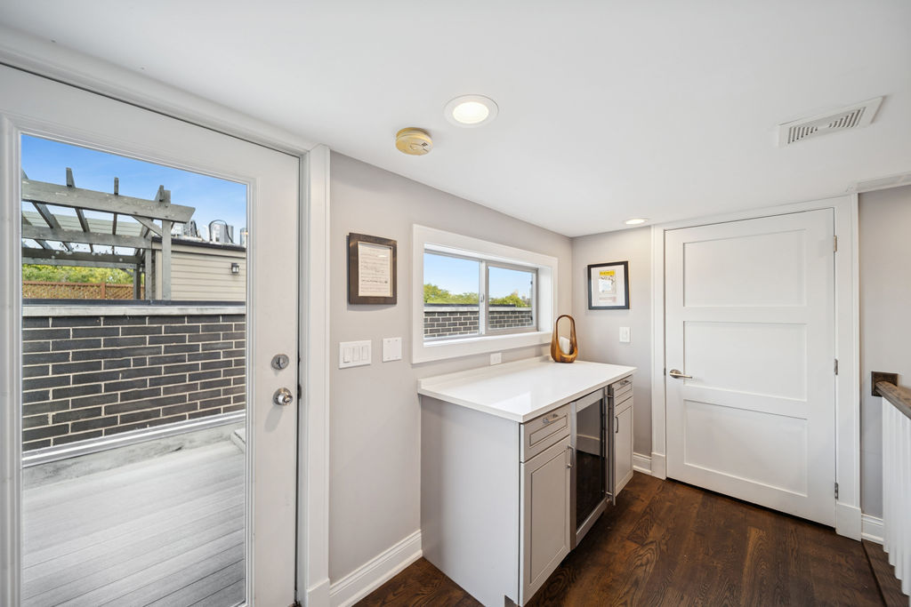 3044 North Racine Avenue, Unit 3 Chicago, IL 60657 - Photo 21 of 29 a view of a kitchen with a sink and dishwasher