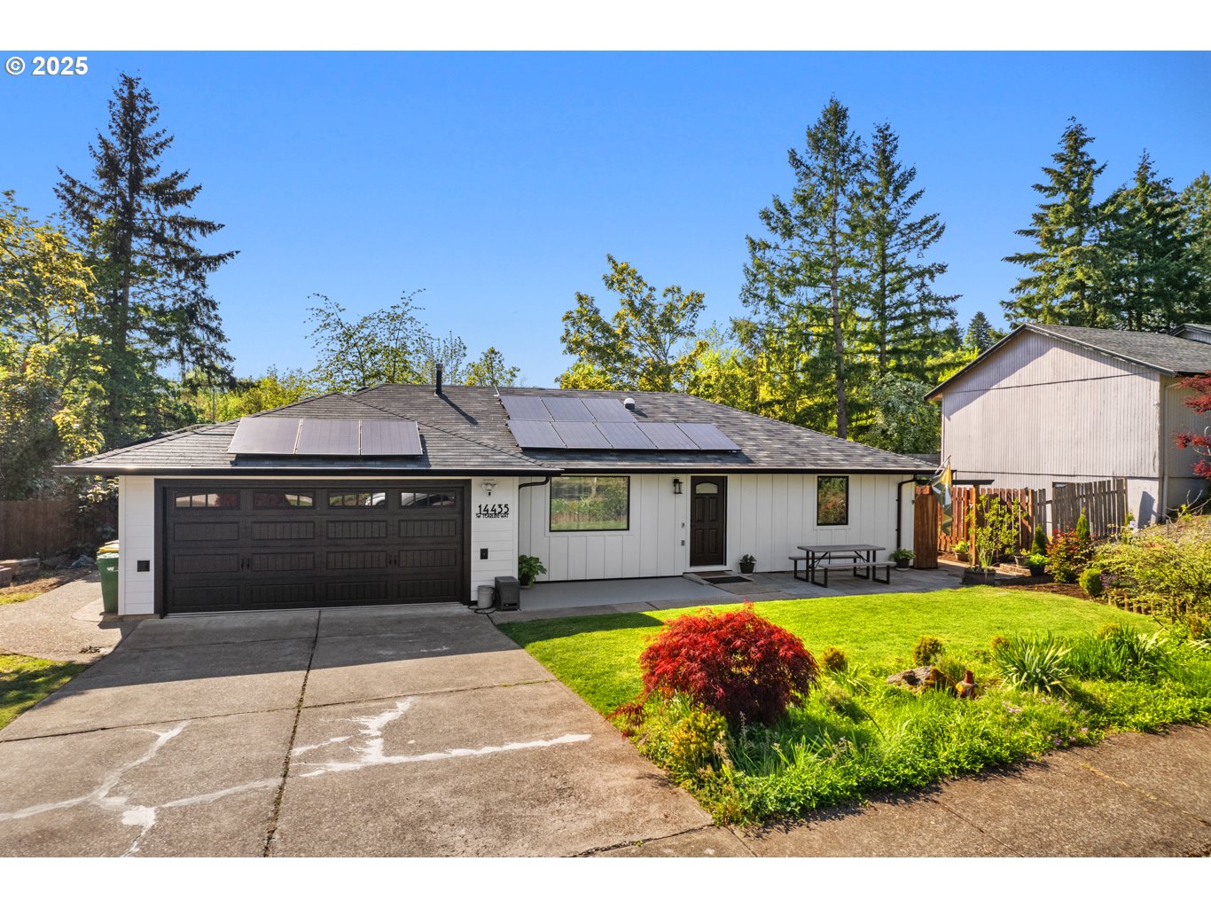 14435 Southwest Yearling Way Beaverton, OR 97008 - Photo 2 of 47 a house view with a garden space