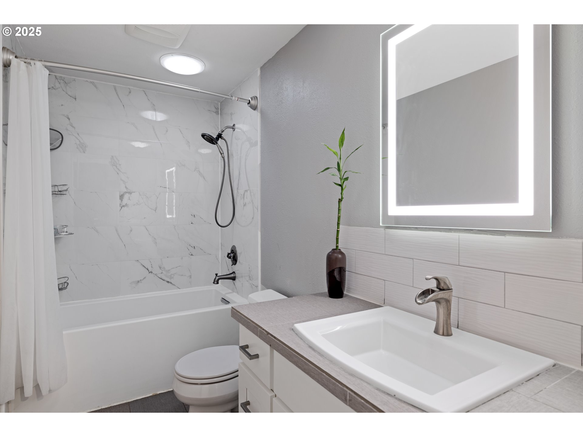 14435 Southwest Yearling Way Beaverton, OR 97008 - Photo 29 of 47 a bathroom with a sink a toilet and a bathtub