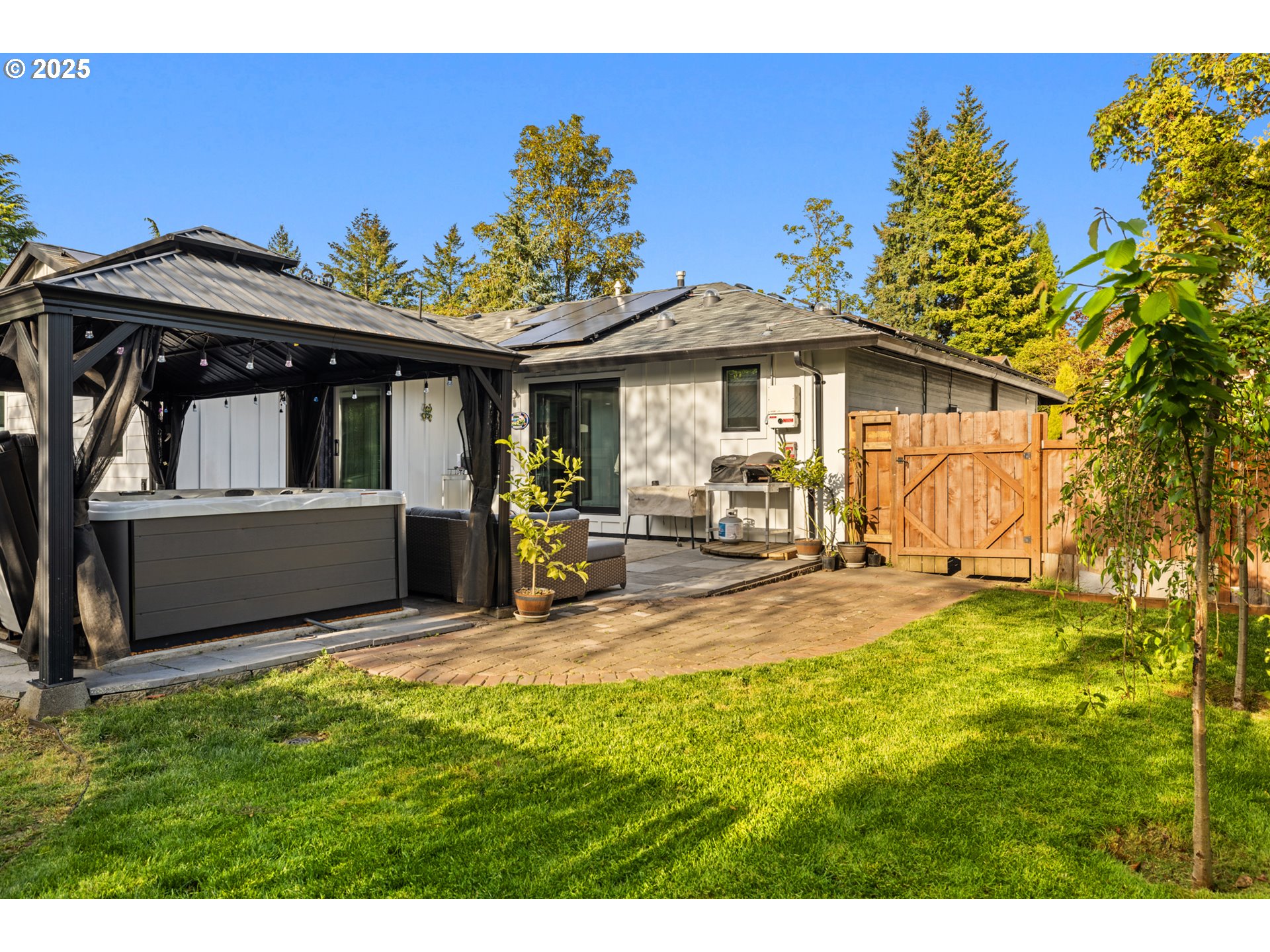 14435 Southwest Yearling Way Beaverton, OR 97008 - Photo 34 of 47 a view of a backyard with a sitting area