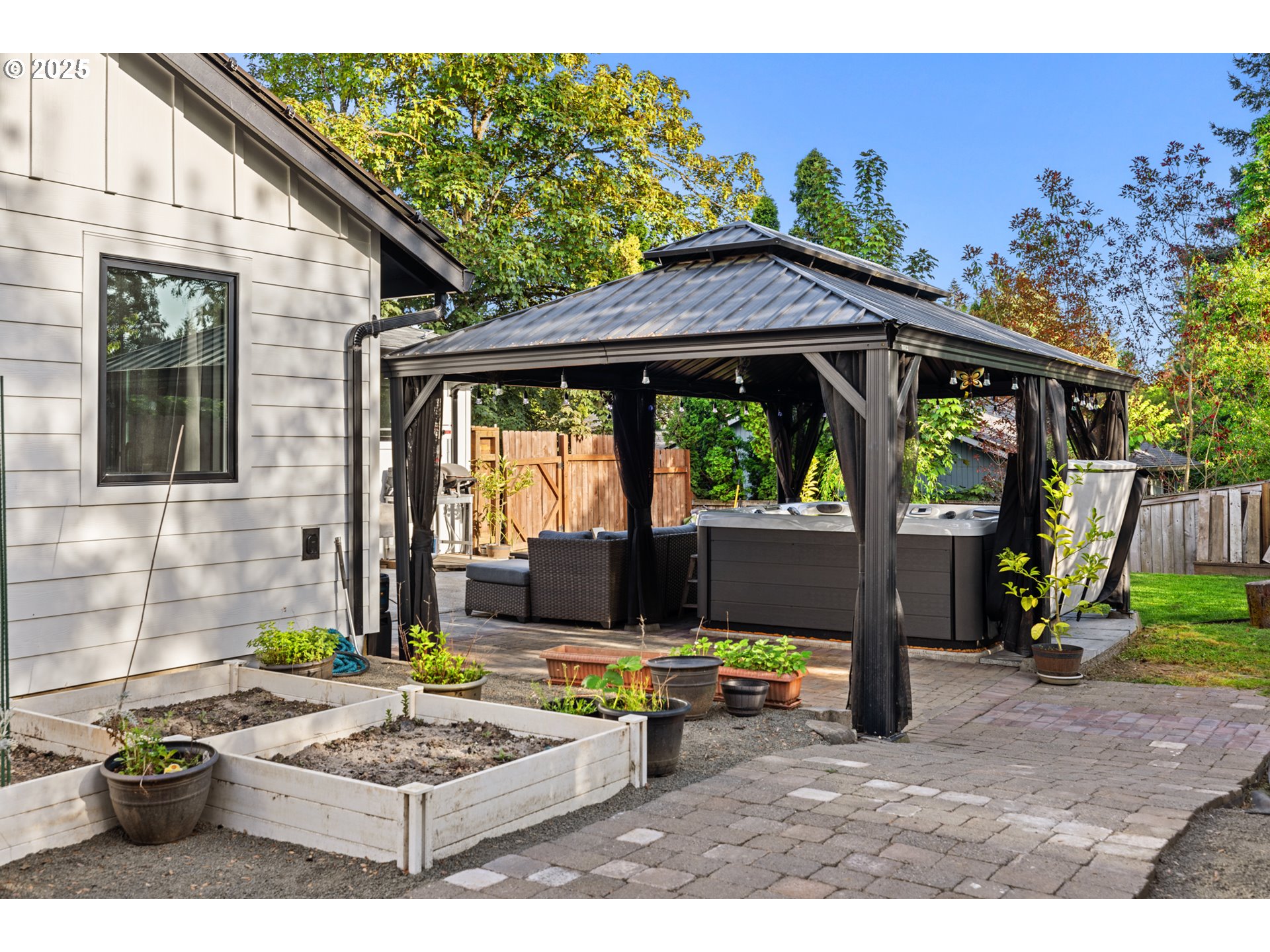 14435 Southwest Yearling Way Beaverton, OR 97008 - Photo 35 of 47 a view of a backyard with a patio