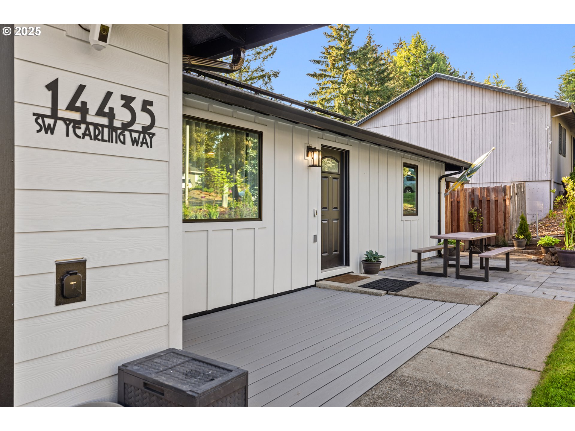 14435 Southwest Yearling Way Beaverton, OR 97008 - Photo 6 of 47 a backyard of a house with table and chairs