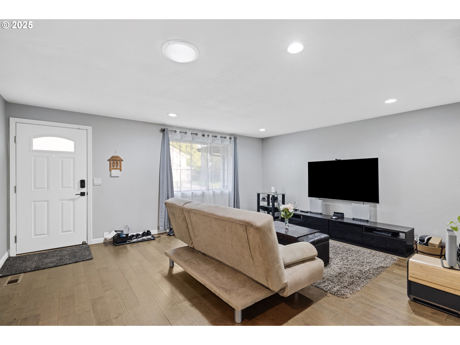 14435 Southwest Yearling Way Beaverton, OR 97008 - Photo 7 of 47 a living room with furniture and a flat screen tv