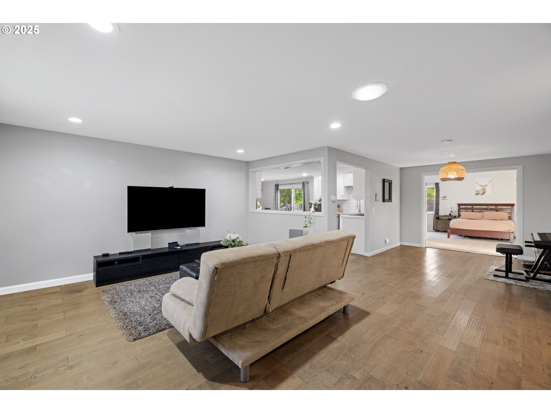14435 Southwest Yearling Way Beaverton, OR 97008 - Photo 8 of 47 a living room with furniture and a flat screen tv