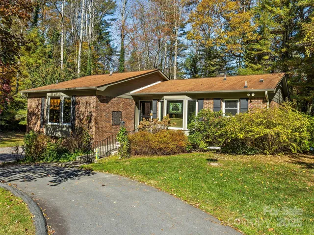 a view of balcony with furniture