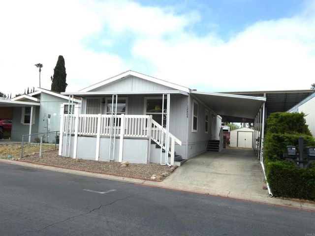 a front view of a house with a porch