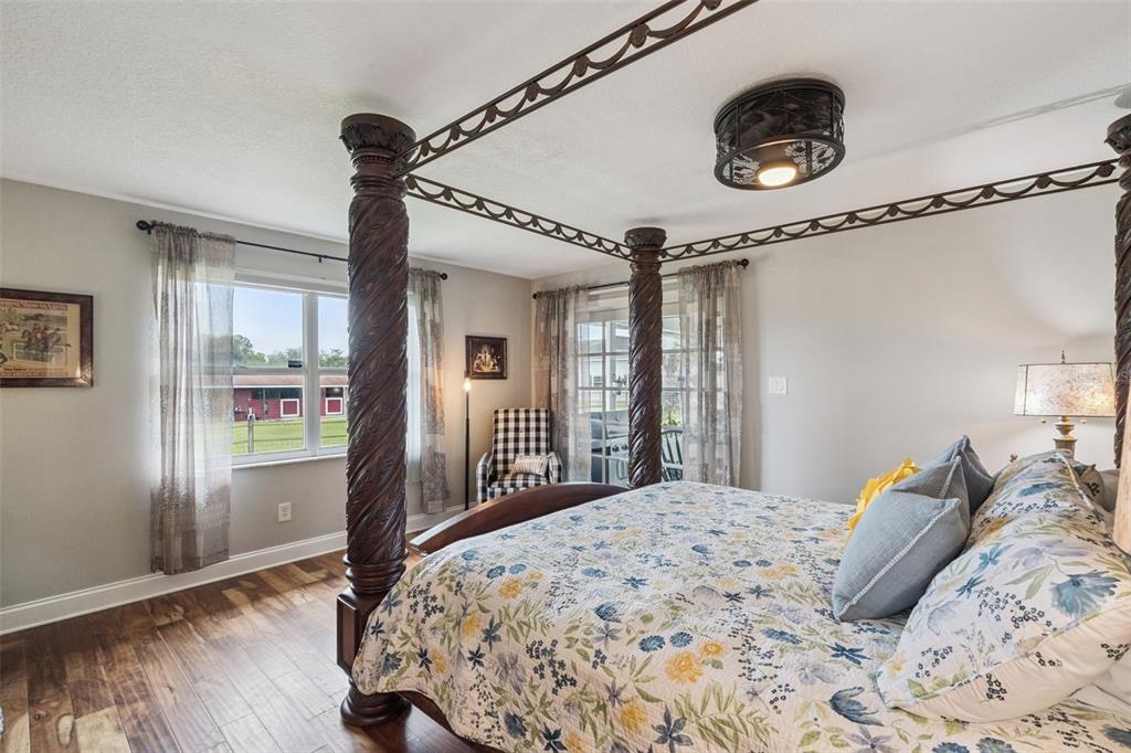 1330 Lake Mills Road Chuluota, FL 32766 - Photo 23 of 59 a bedroom with a bed and a window
