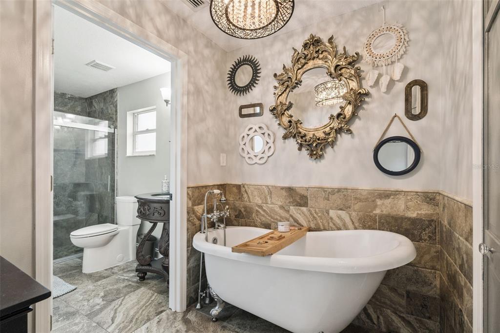 1330 Lake Mills Road Chuluota, FL 32766 - Photo 25 of 59 a bathroom with a toilet sink and mirror