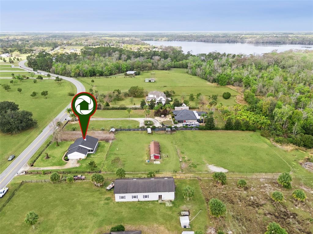 1330 Lake Mills Road Chuluota, FL 32766 - Photo 51 of 59 a view of a lake with a city
