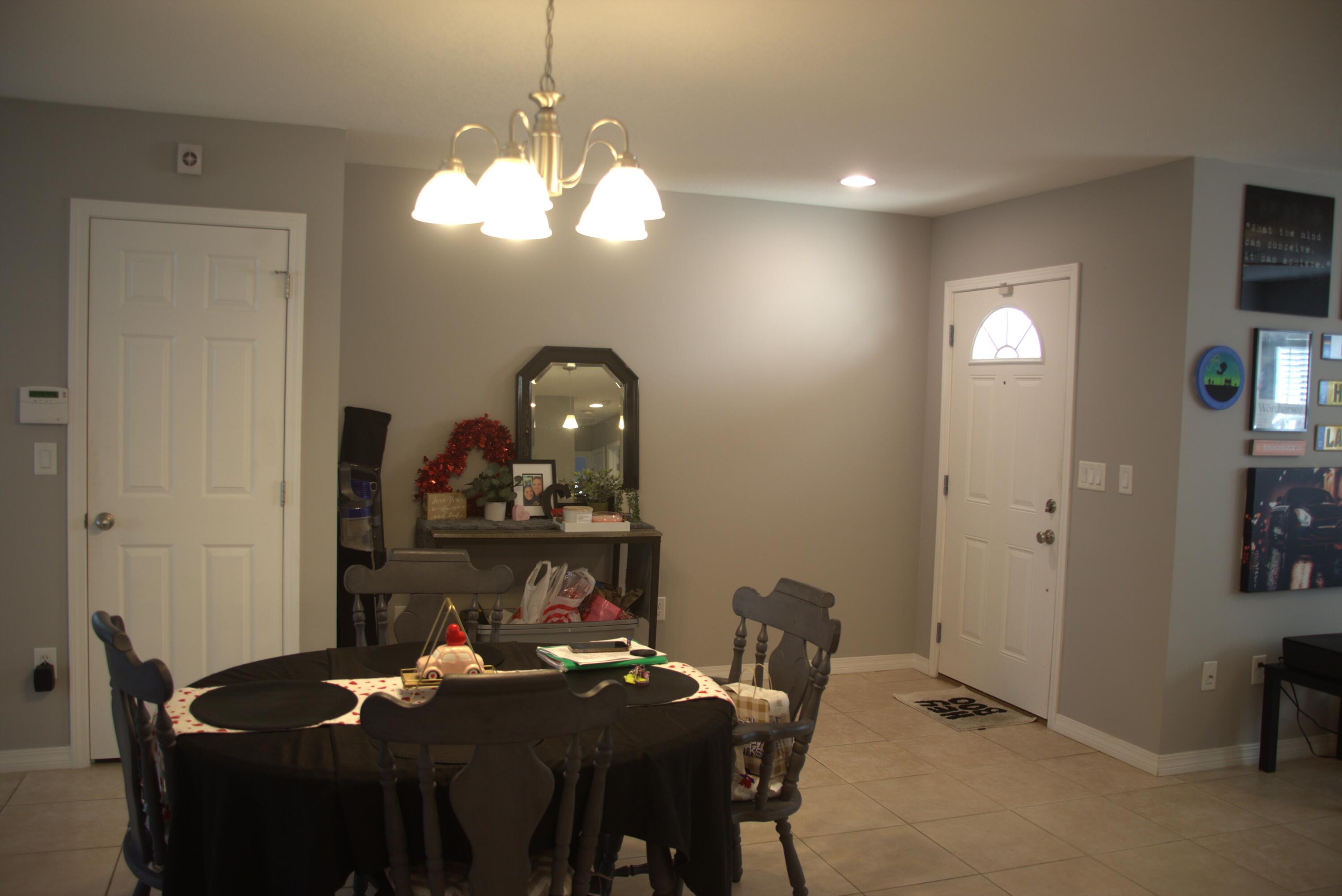 75 7th Avenue Shalimar, FL 32579 - Photo 14 of 42 a dining room with a table and chairs