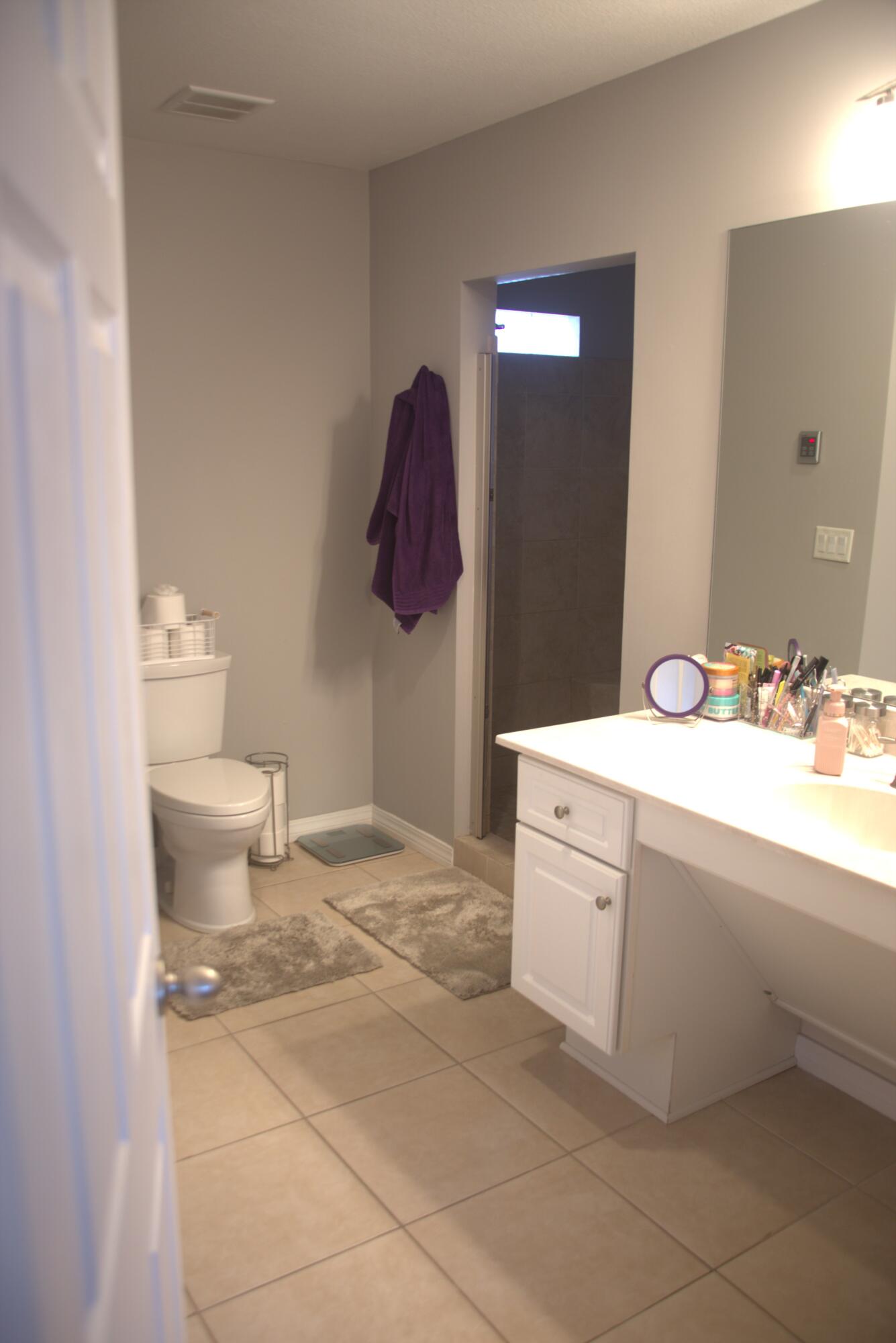 75 7th Avenue Shalimar, FL 32579 - Photo 23 of 42 a bathroom with a sink vanity and toilet