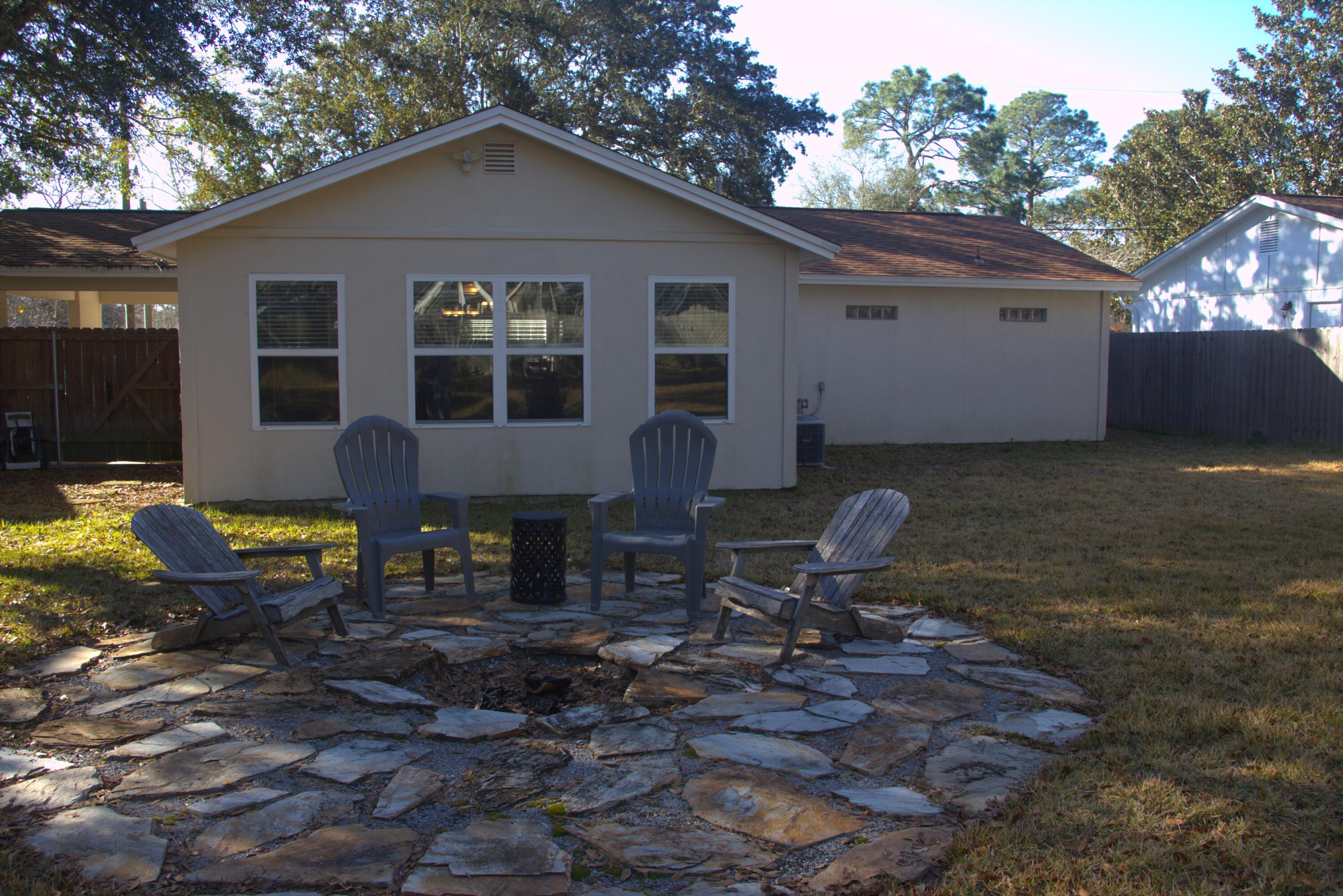 75 7th Avenue Shalimar, FL 32579 - Photo 28 of 42 a view of a house with backyard and sitting area