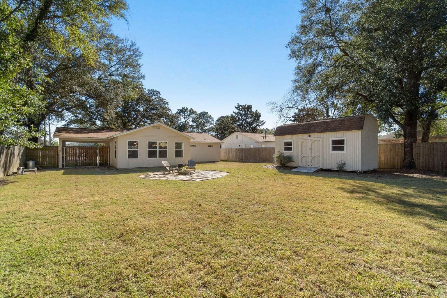 75 7th Avenue Shalimar, FL 32579 - Photo 39 of 42 a front view of house with yard and seating area
