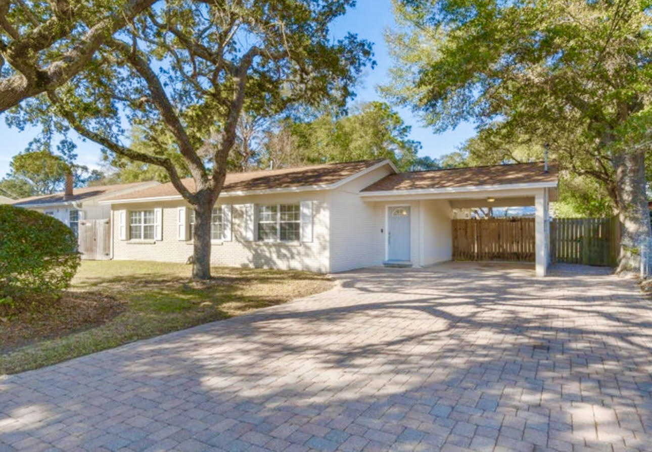 75 7th Avenue Shalimar, FL 32579 - Photo 42 of 42 a front view of a house with a garden