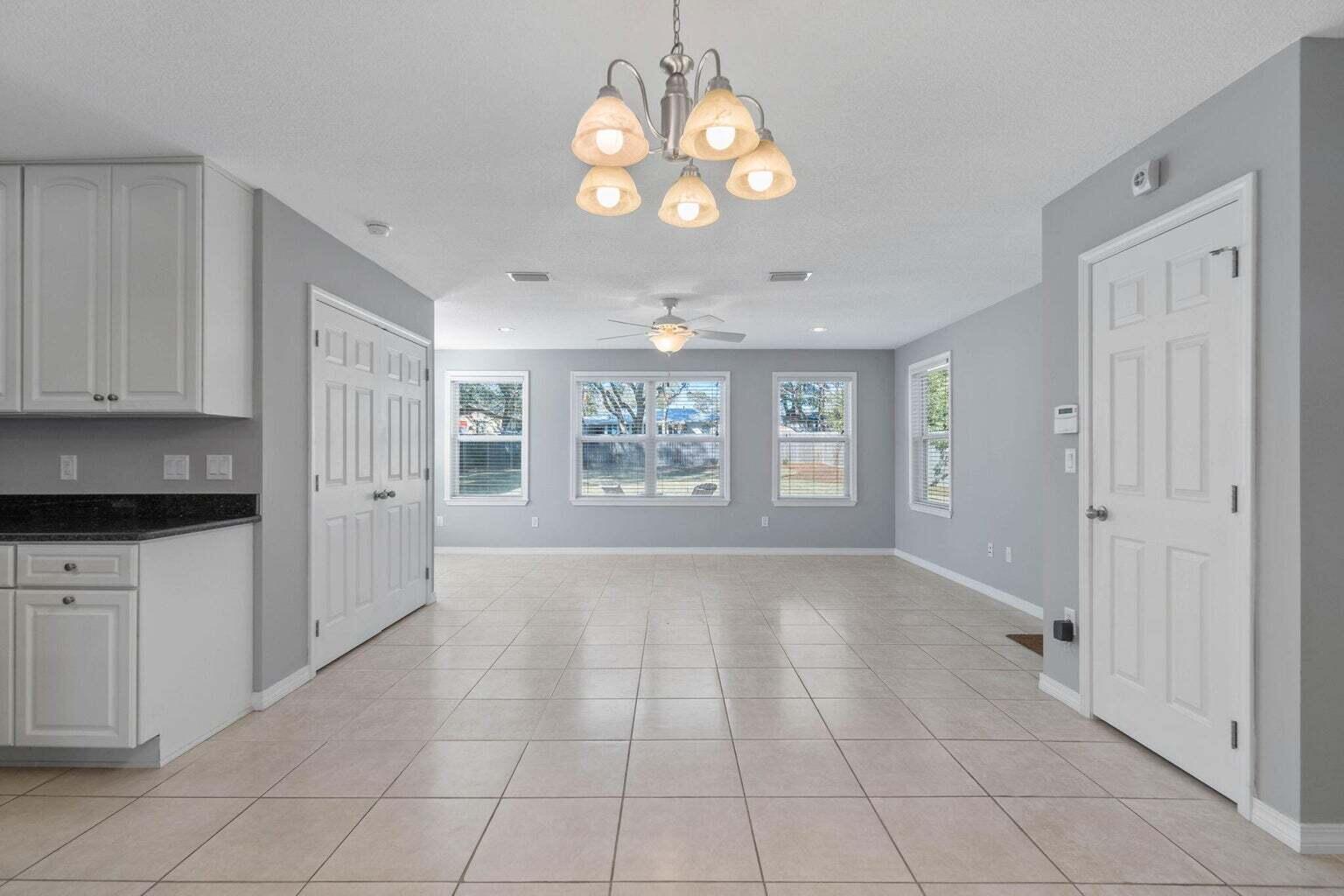 75 7th Avenue Shalimar, FL 32579 - Photo 9 of 42 a view of an empty room and window