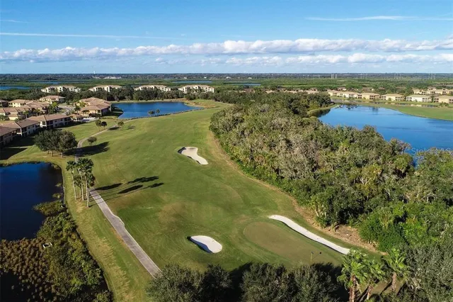a view of a city with mountains in the background