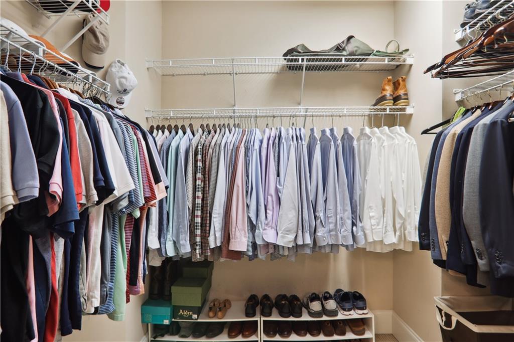 3552 Roswell Road Northwest Atlanta, GA 30305 - Photo 22 of 32 a view of walk in closet with clothes and shoes