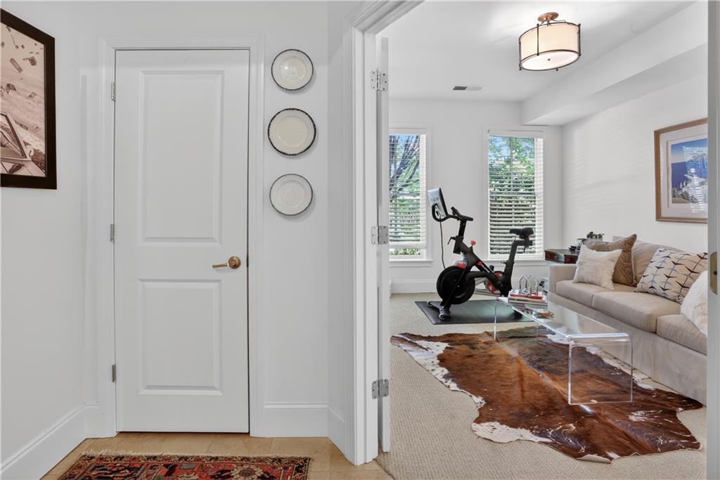 3552 Roswell Road Northwest Atlanta, GA 30305 - Photo 25 of 32 a living room with furniture and a window