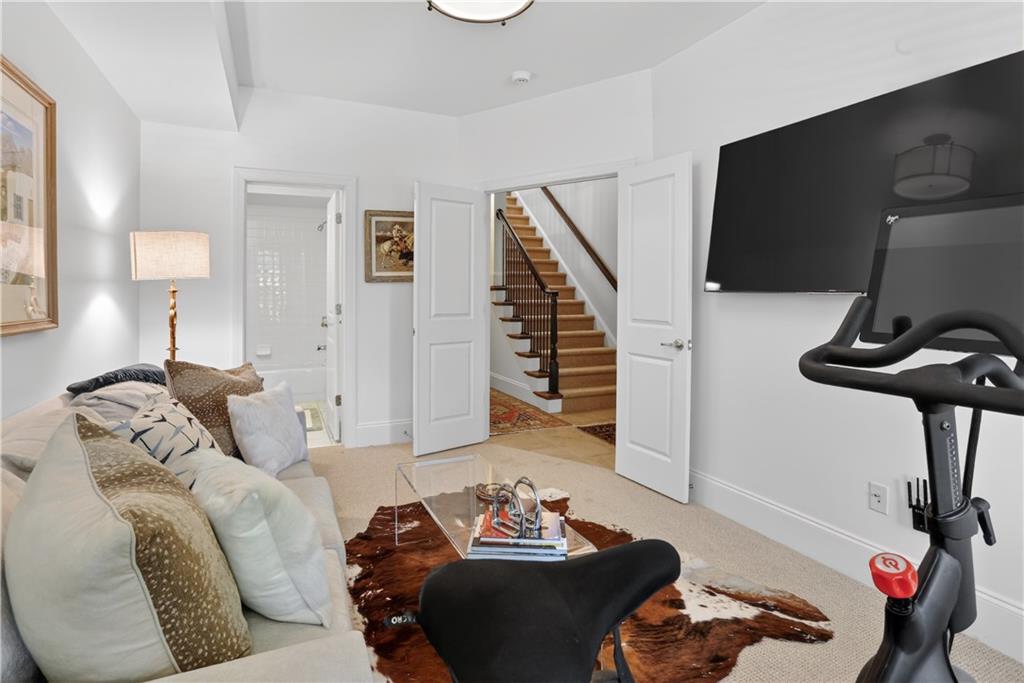 3552 Roswell Road Northwest Atlanta, GA 30305 - Photo 27 of 32 a living room with furniture and a wooden floor