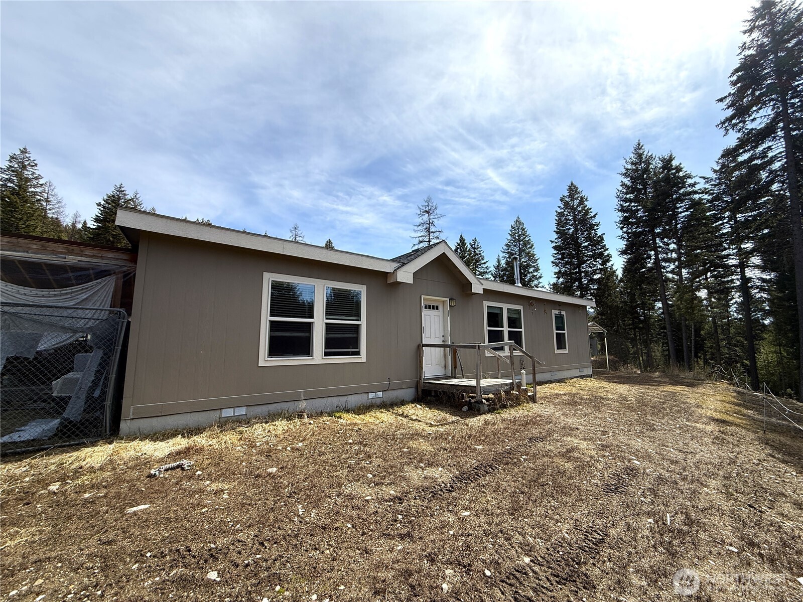 116 Cape Labelle Road Wauconda, WA 98859 - Photo 2 of 35 a house view with backyard space