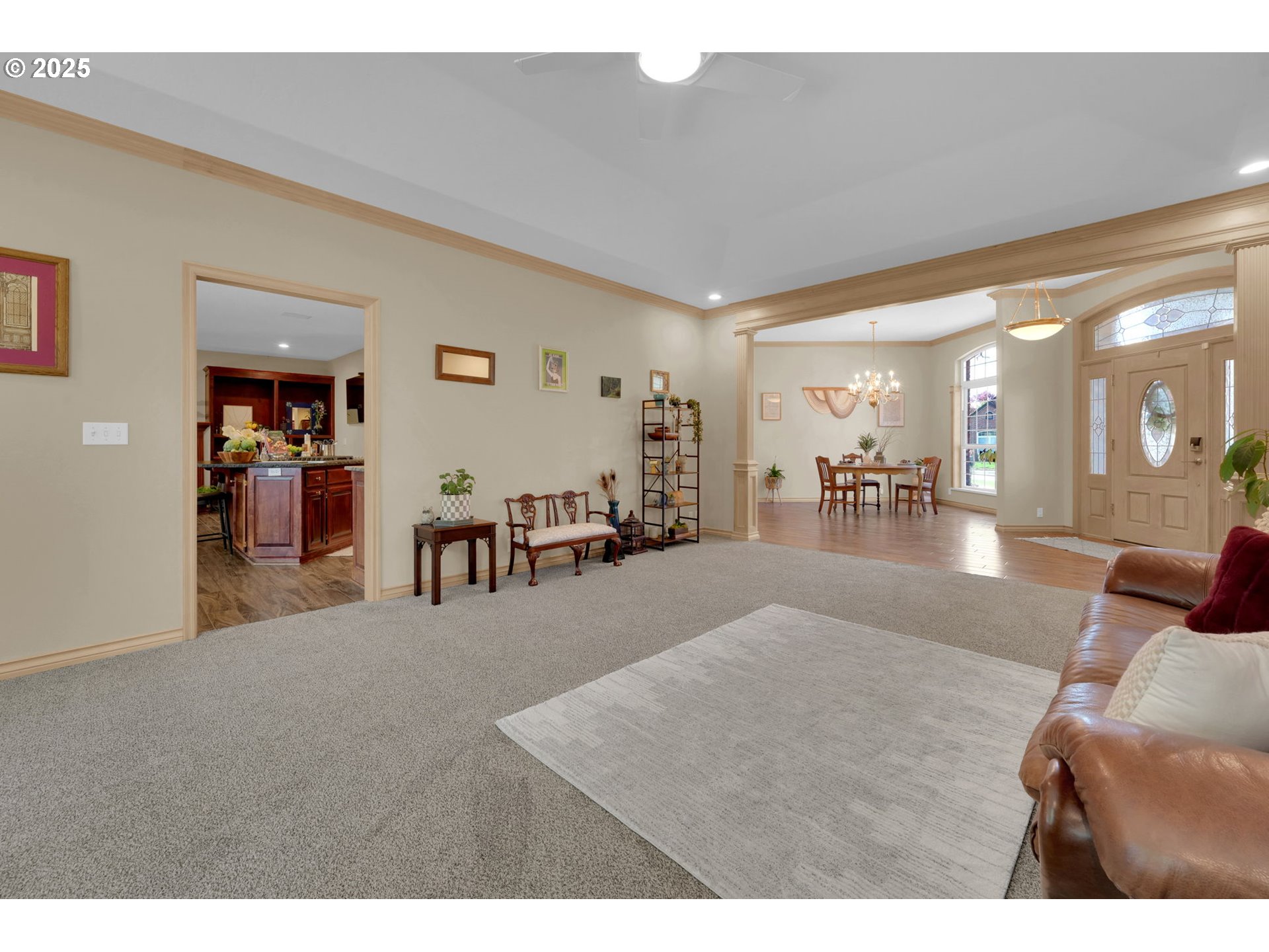 1417 Wimbledon Place Springfield, OR 97477 - Photo 14 of 48 a living room with furniture and a large mirror