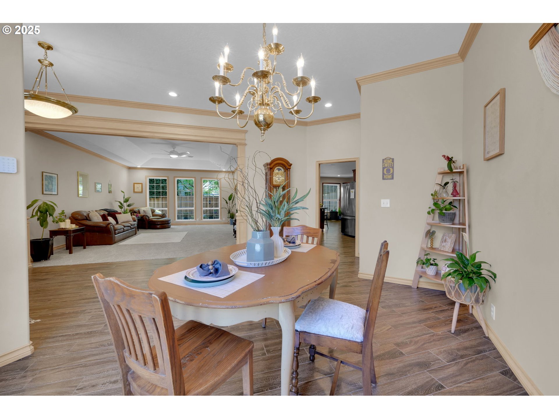 1417 Wimbledon Place Springfield, OR 97477 - Photo 16 of 48 a view of a dining room with furniture and wooden floor