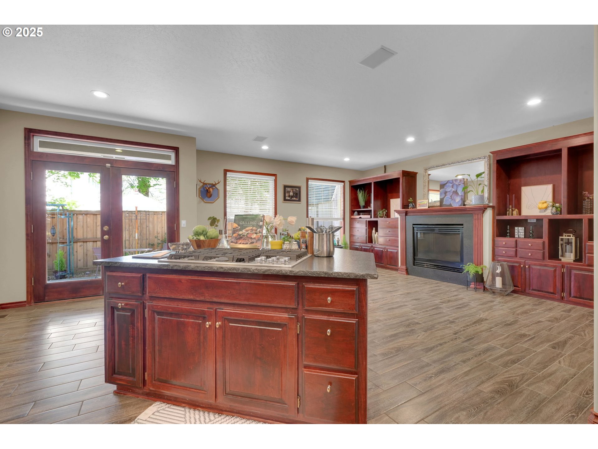 1417 Wimbledon Place Springfield, OR 97477 - Photo 19 of 48 a kitchen with stainless steel appliances granite countertop a refrigerator and wooden cabinets
