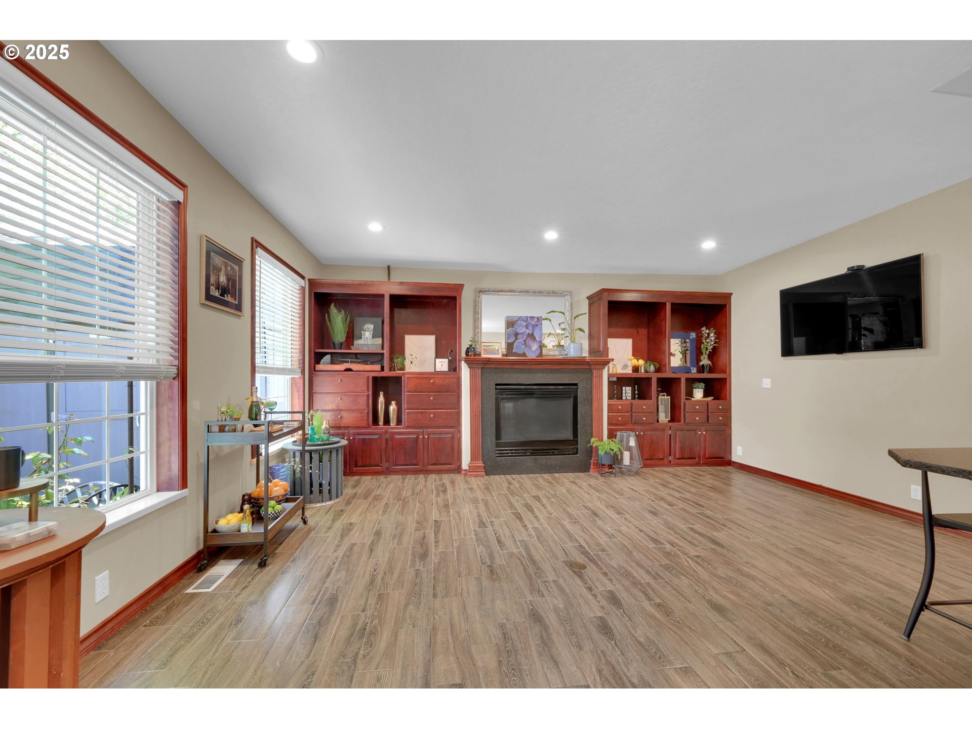 1417 Wimbledon Place Springfield, OR 97477 - Photo 22 of 48 a living room with furniture and a flat screen tv