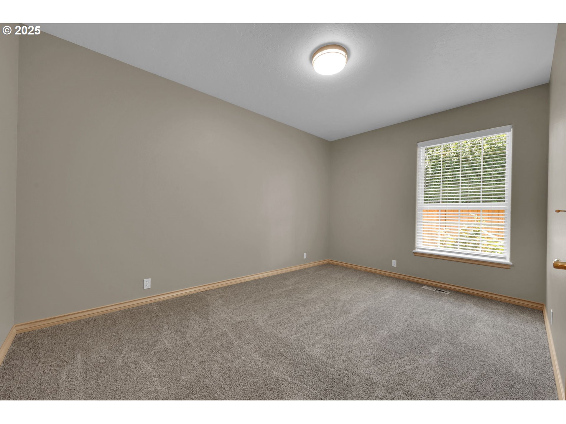 1417 Wimbledon Place Springfield, OR 97477 - Photo 26 of 48 a view of an empty room with a window
